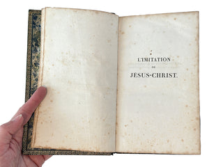 L’IMITATION DE JÉSUS-CHRIST

Elegant 19th Century French Devotional in Gilt-Tooled Black Leather 1818